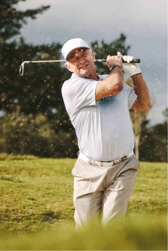 Older man golfing